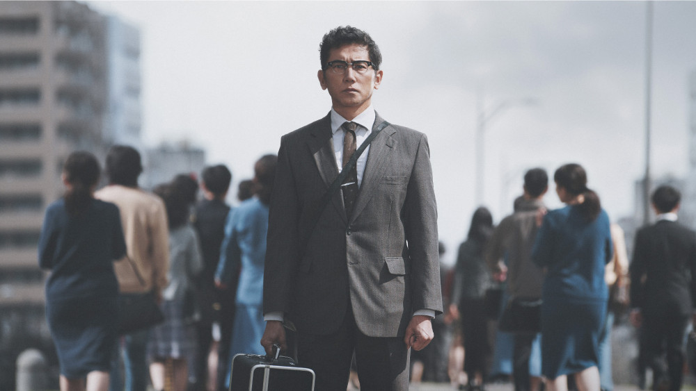 八月の声を運ぶ男