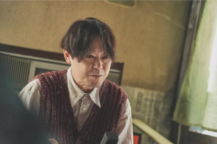 八月の声を運ぶ男
